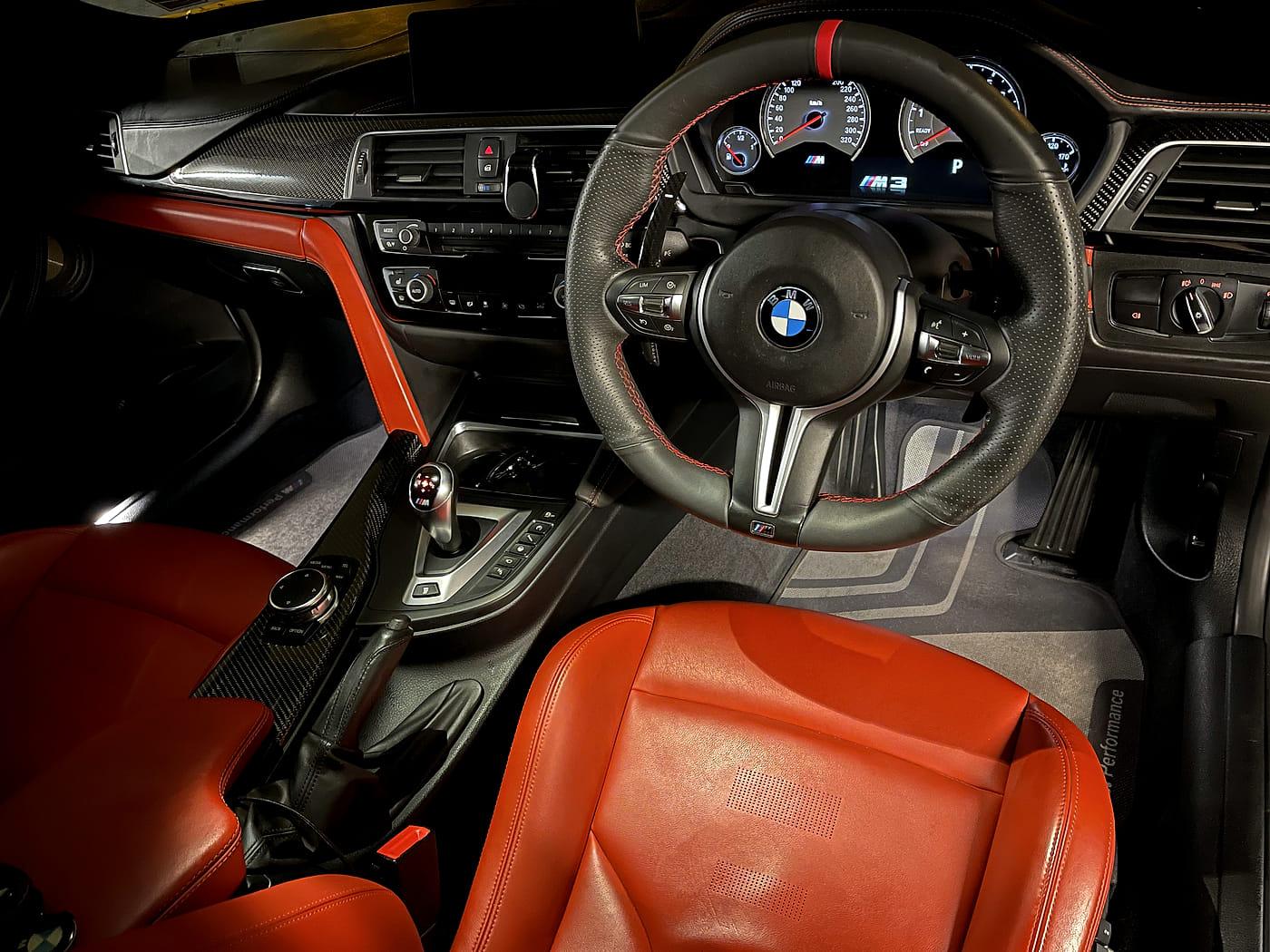 Detailed red leather BMW cabin