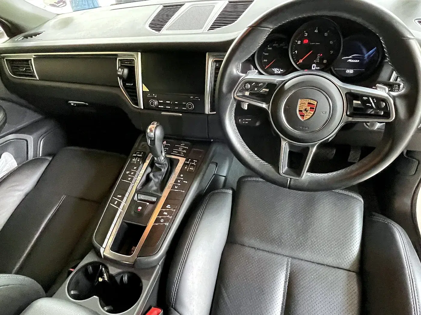 Clean Porsche cockpit and centre console