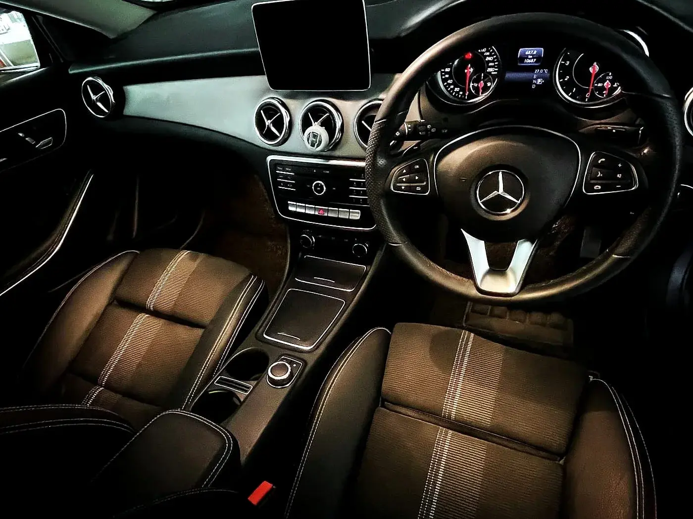 Detailed Mercedes dashboard and front seats