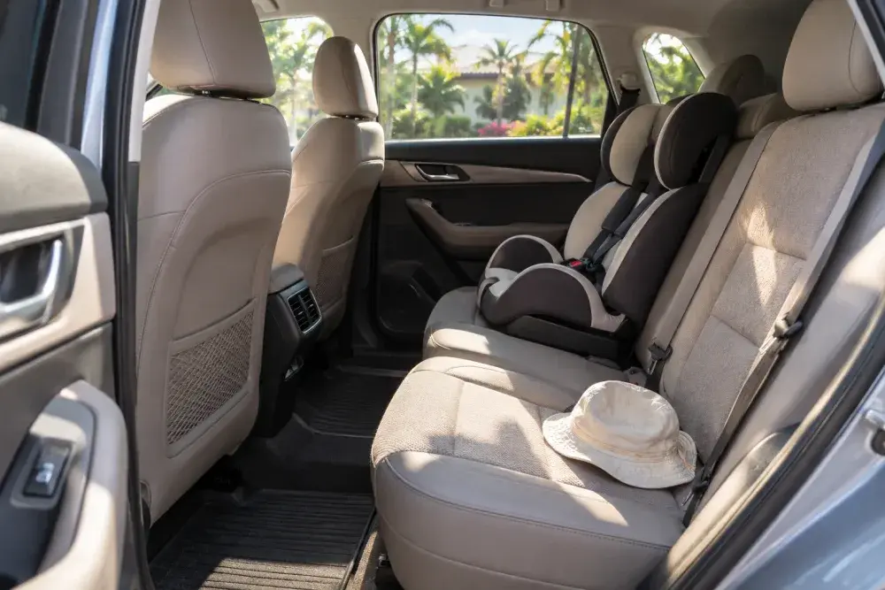 A family car cabin with a child seat